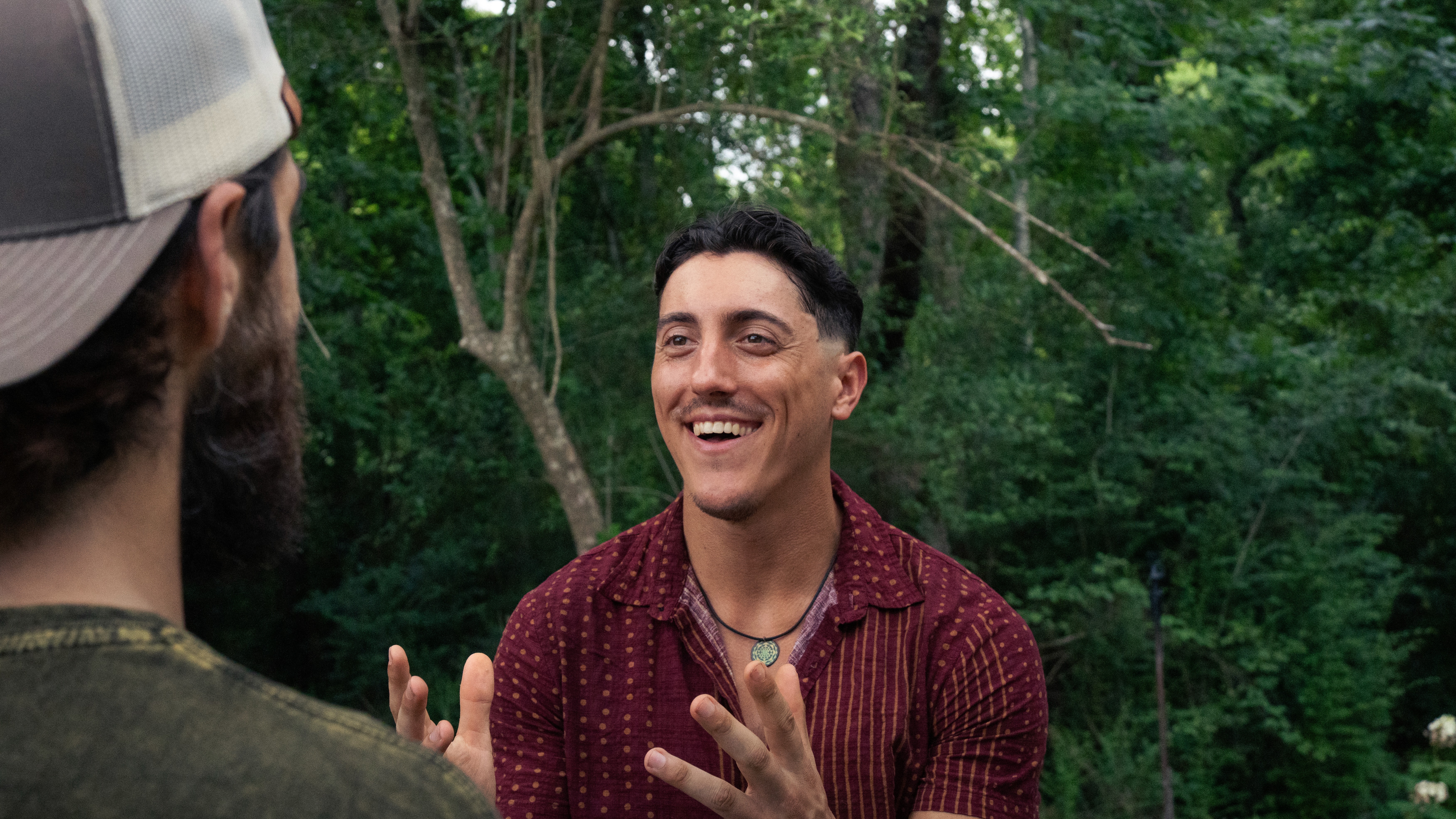 Reese LeBlanc coaching conversation outdoors