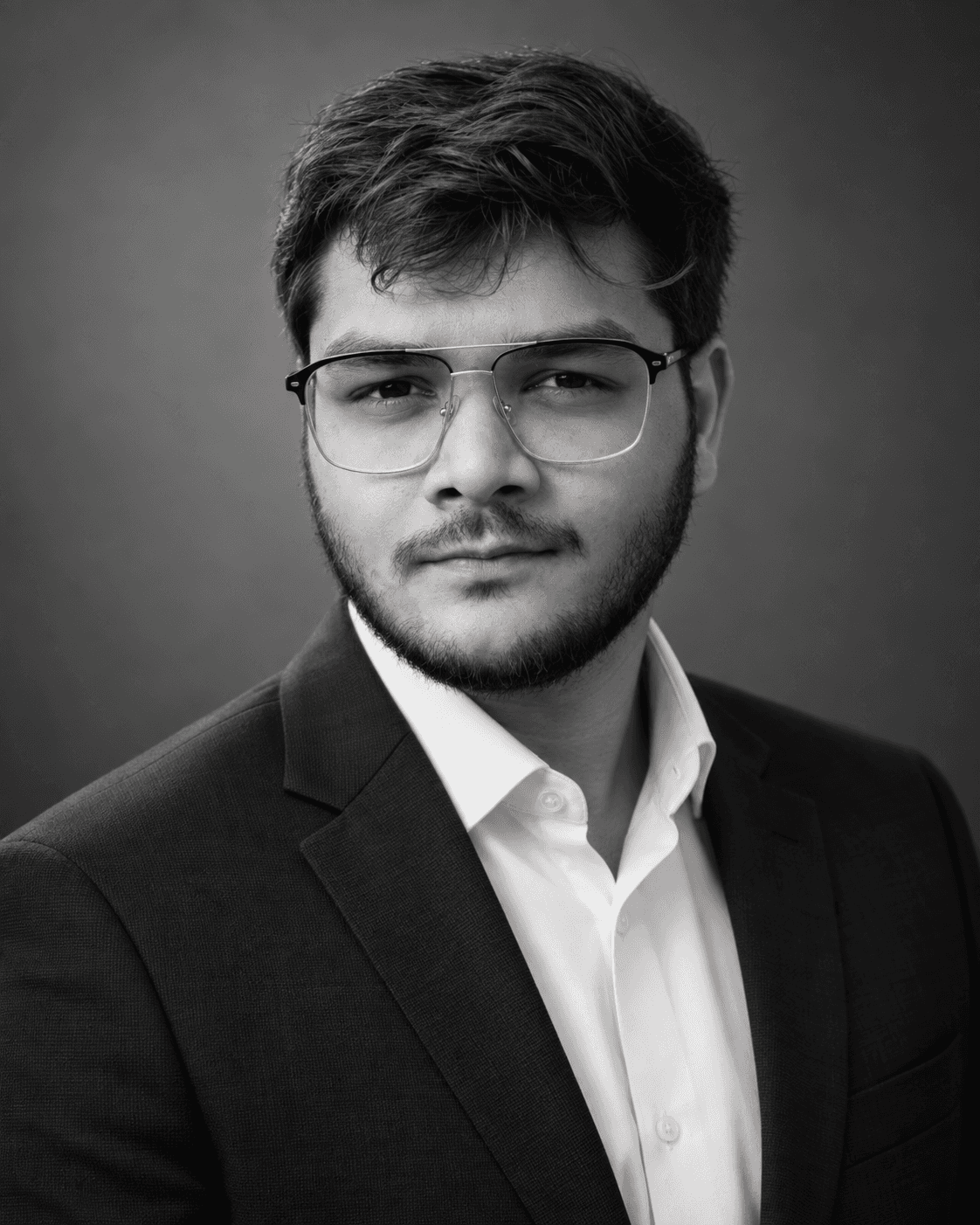 grayscale photo of man facing right