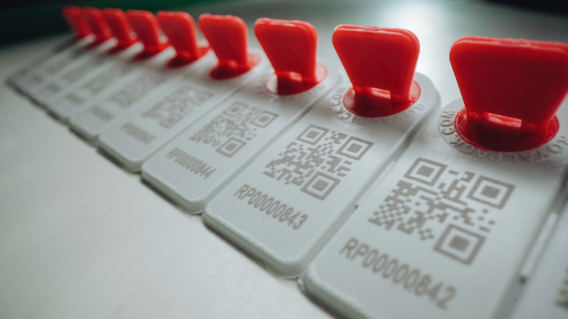 Tamper-evident seals with QR codes and serial numbers from Ryleon provide secure packaging, product authenticity, and full supply chain traceability