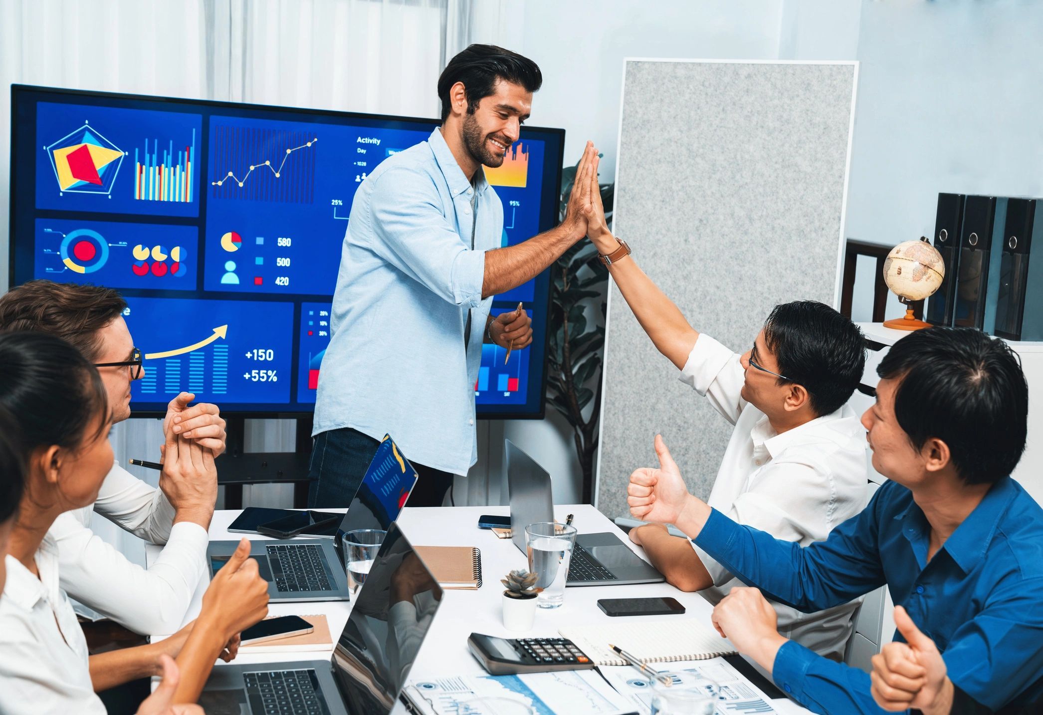 a black and white living room with a large tv