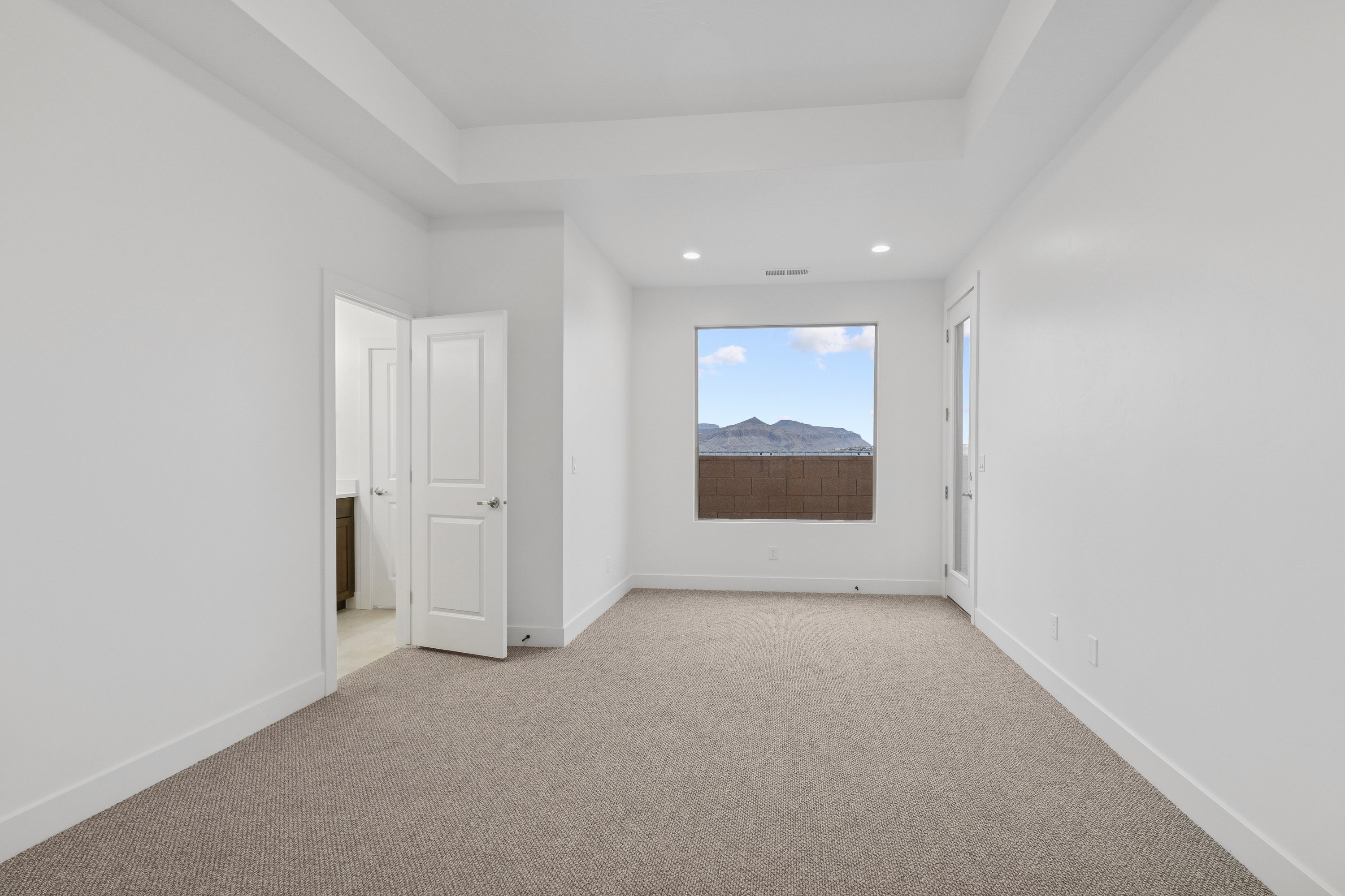 Primary suite in The High Desert Home in Hurricane Utah with spacious layout.