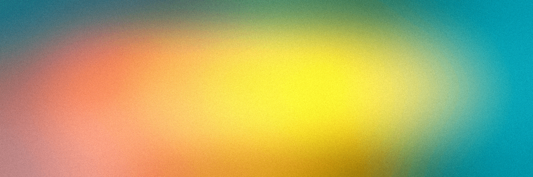 a blurry image of a rainbow colored background
