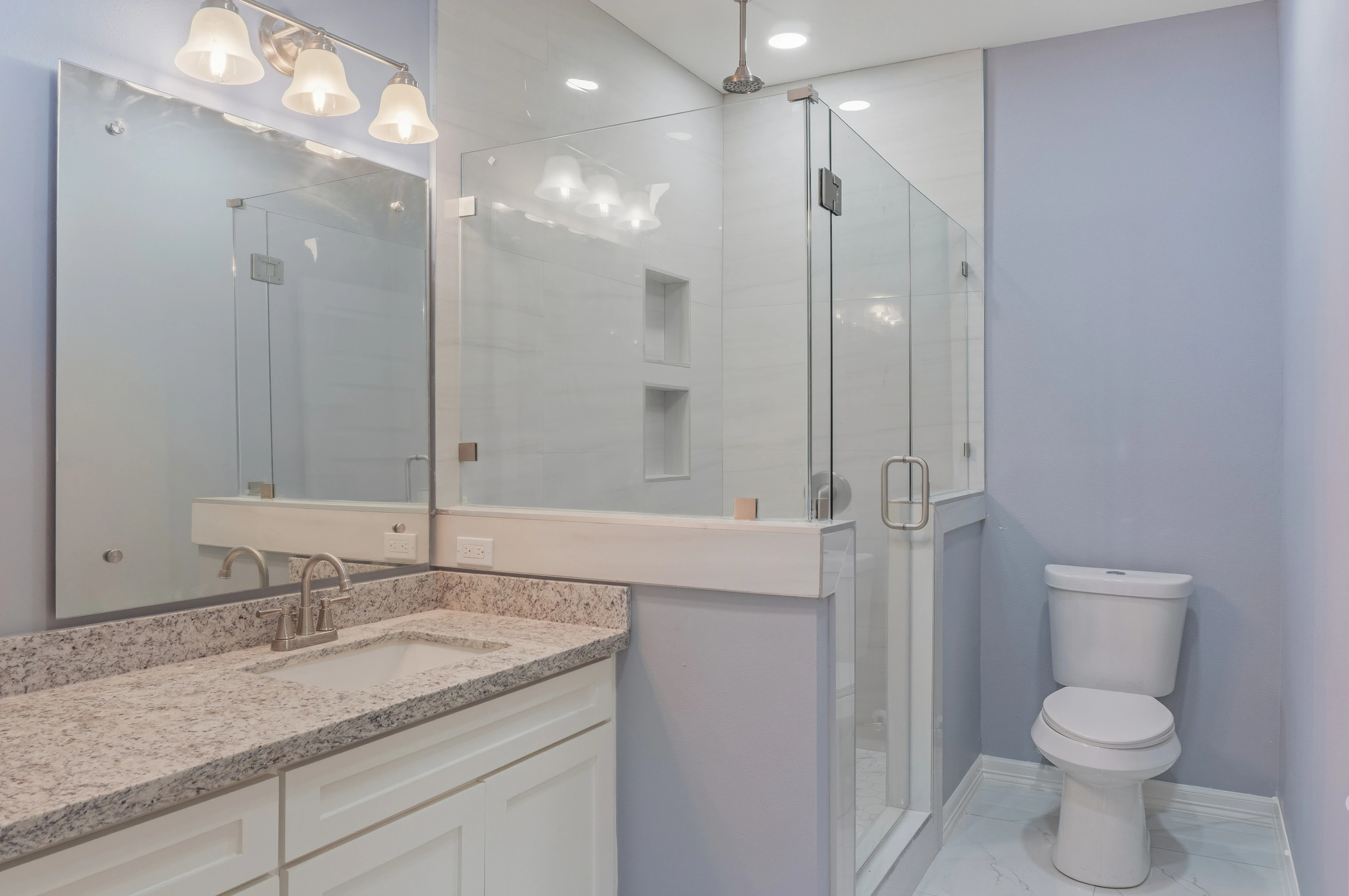 A picture of a house during twilight.