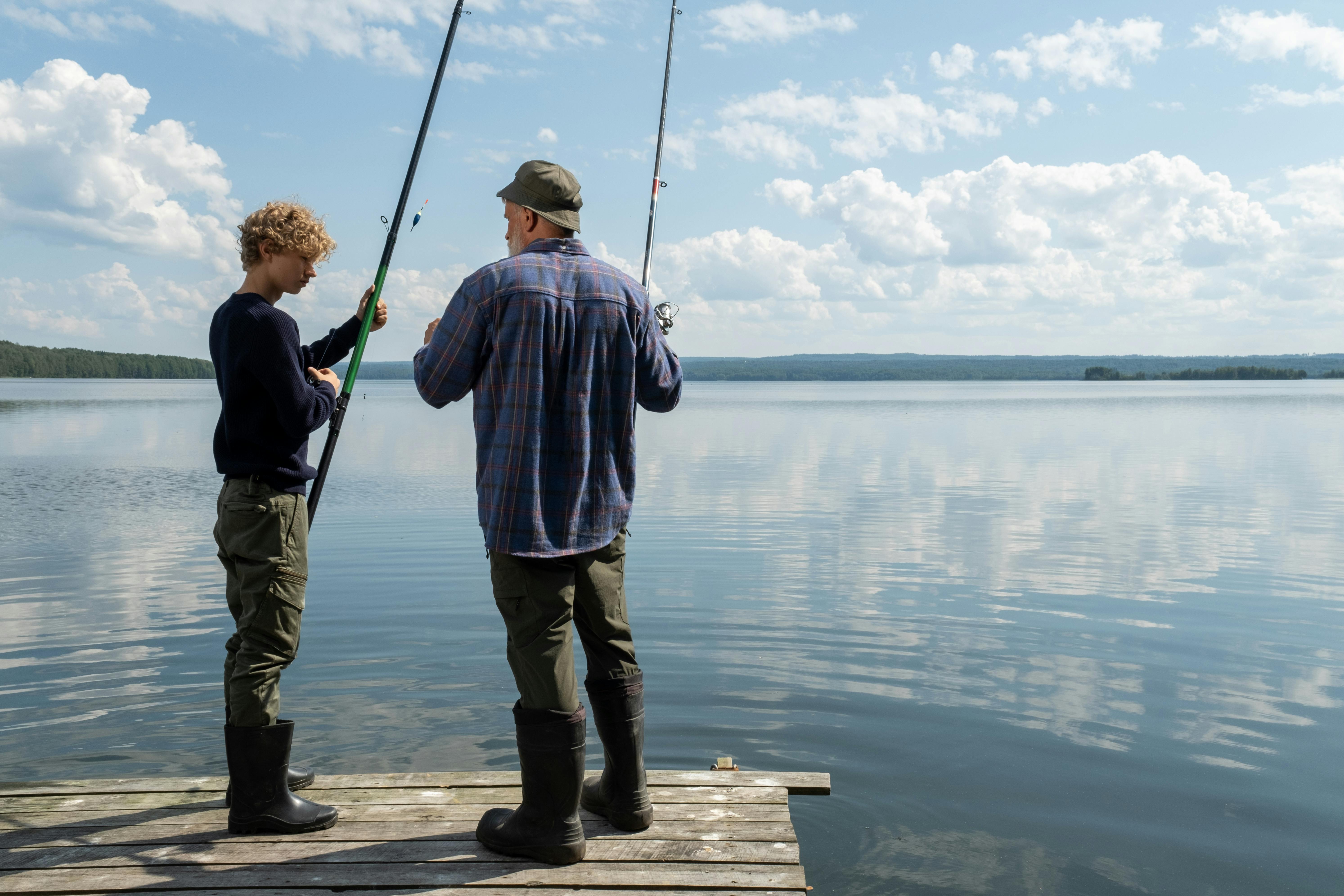 Conversion Truth for Families - Father and son fishing on a beautiful blue lake