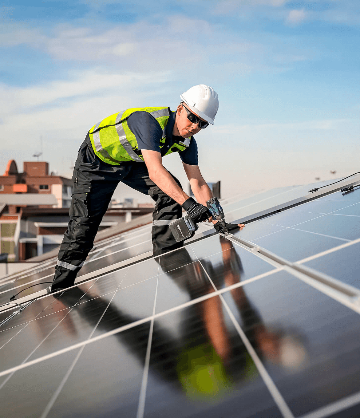 SolarCare engineer carrying out solar panel maintenance on a rooftop