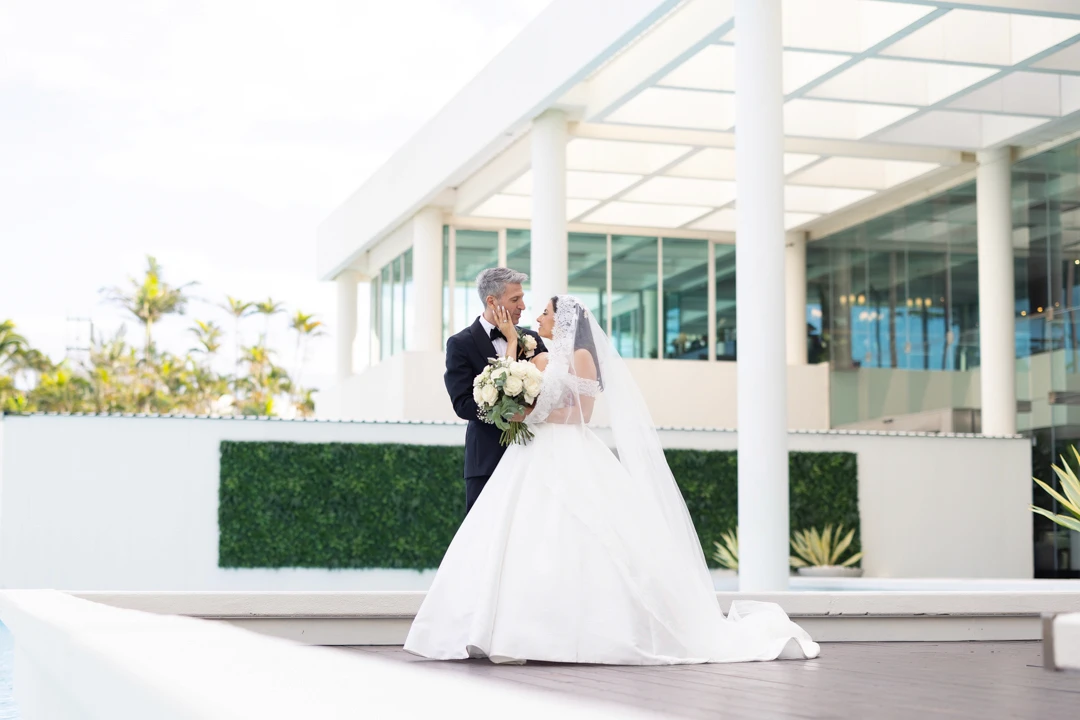 Bride and groom looking into each other's eyes