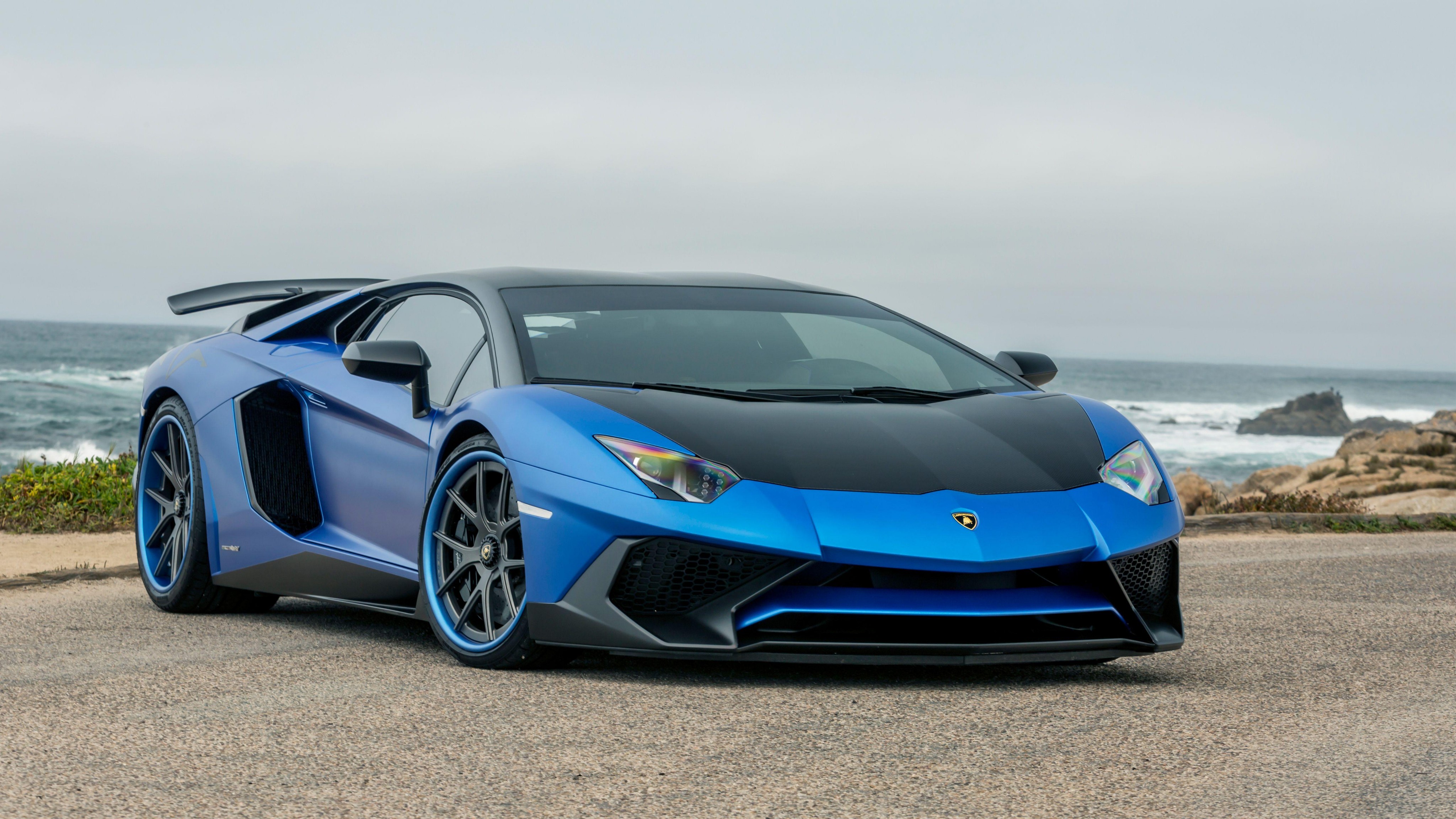 Blue Lamborghini by the coast