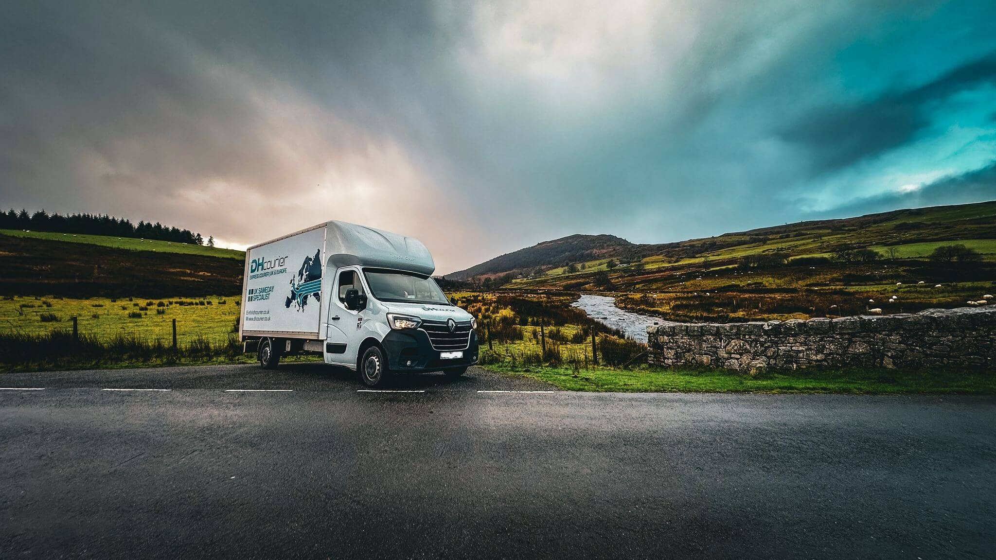 DH Courier Van on a coastal road