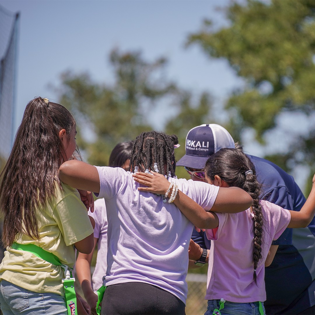 Students building social and emotional skills through guided in-school activities with HOKALI educators.