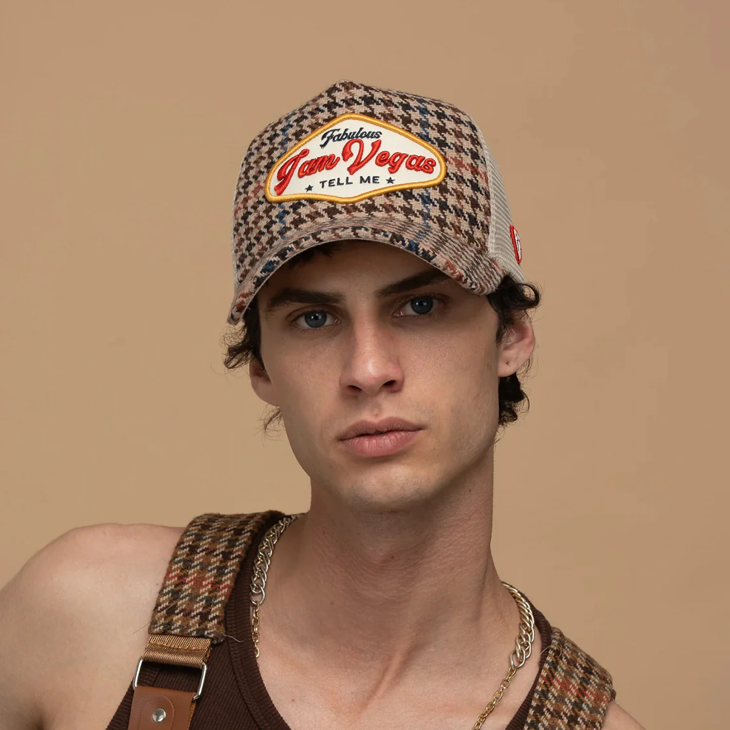 Woman in white breezy shirt.