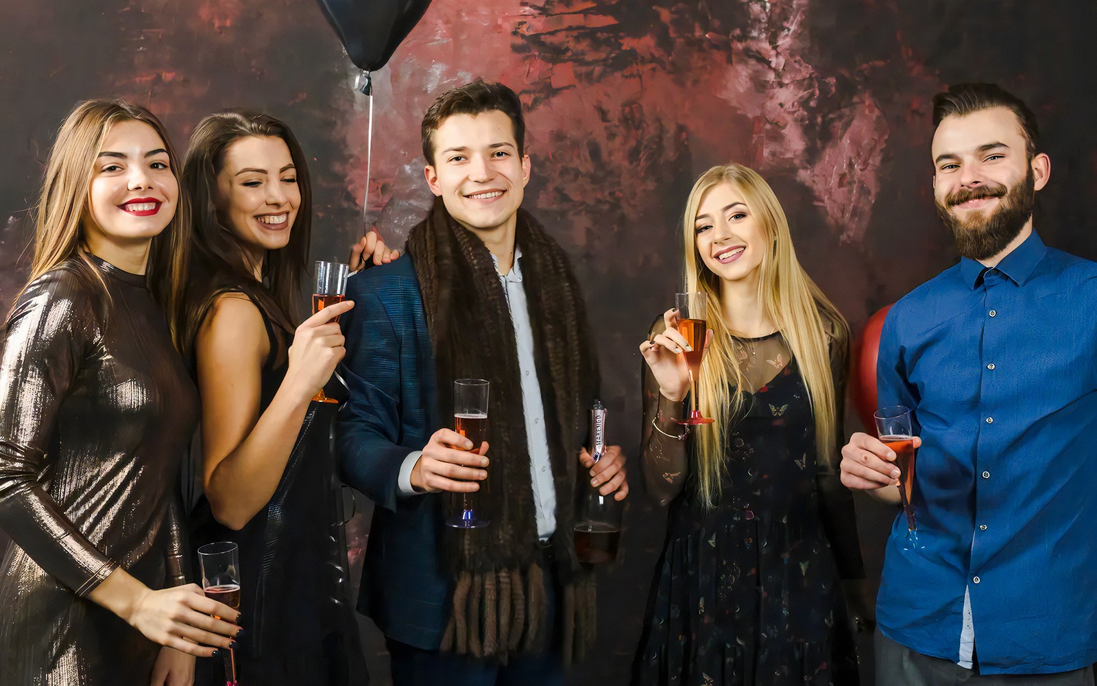 Guests enjoying drinks at the World of Illusions event.