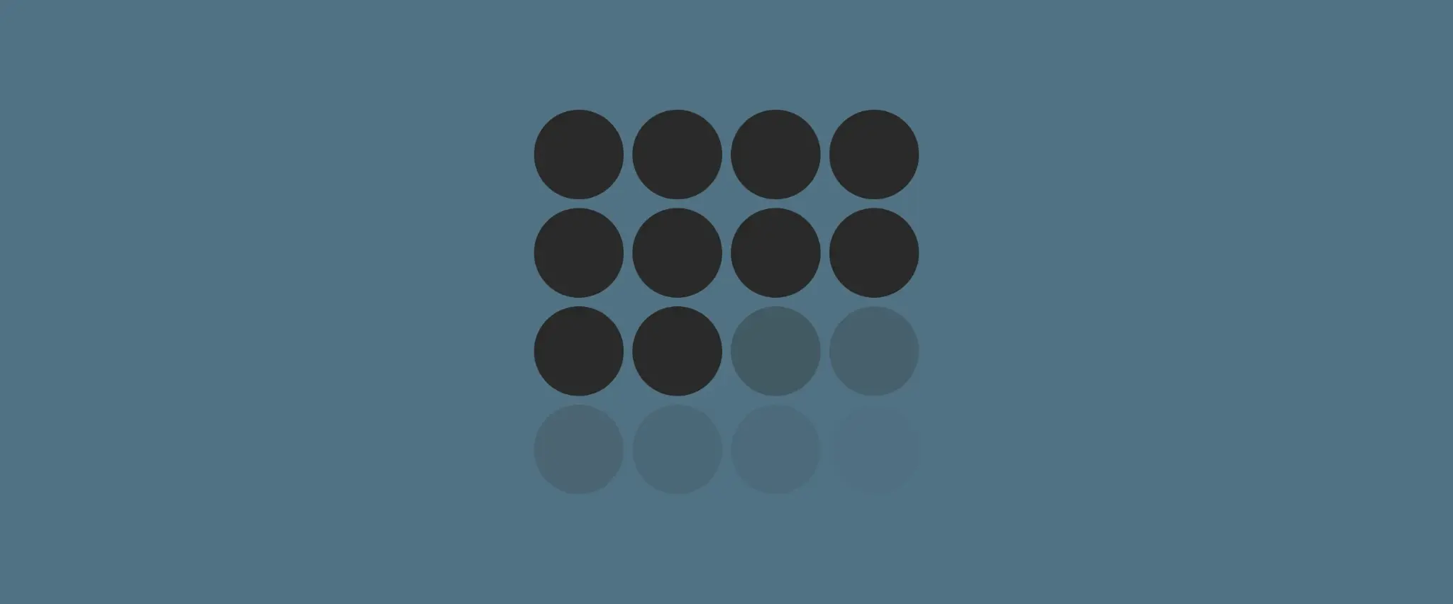 Grid of 12 dark gray circles with reflections