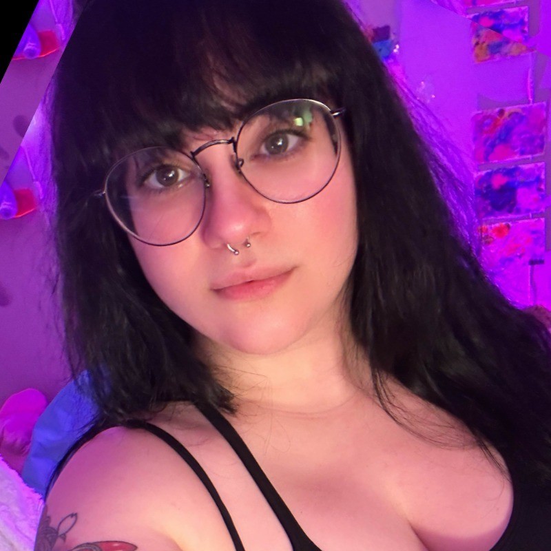 Portrait of a man with glasses and beard