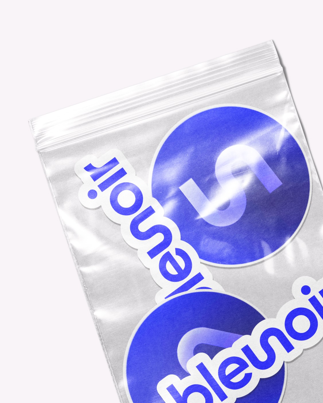 Modern home office setup with a monitor, ergonomic chair, keyboard, and indoor plants near a window with blinds.