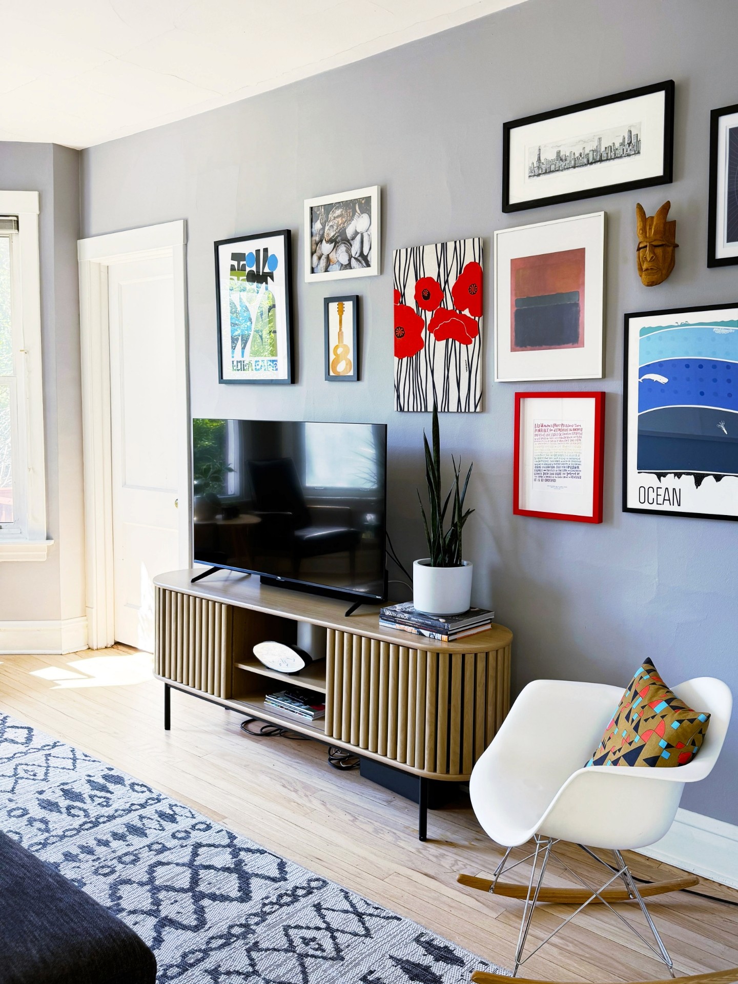 colorful living room gallery wall