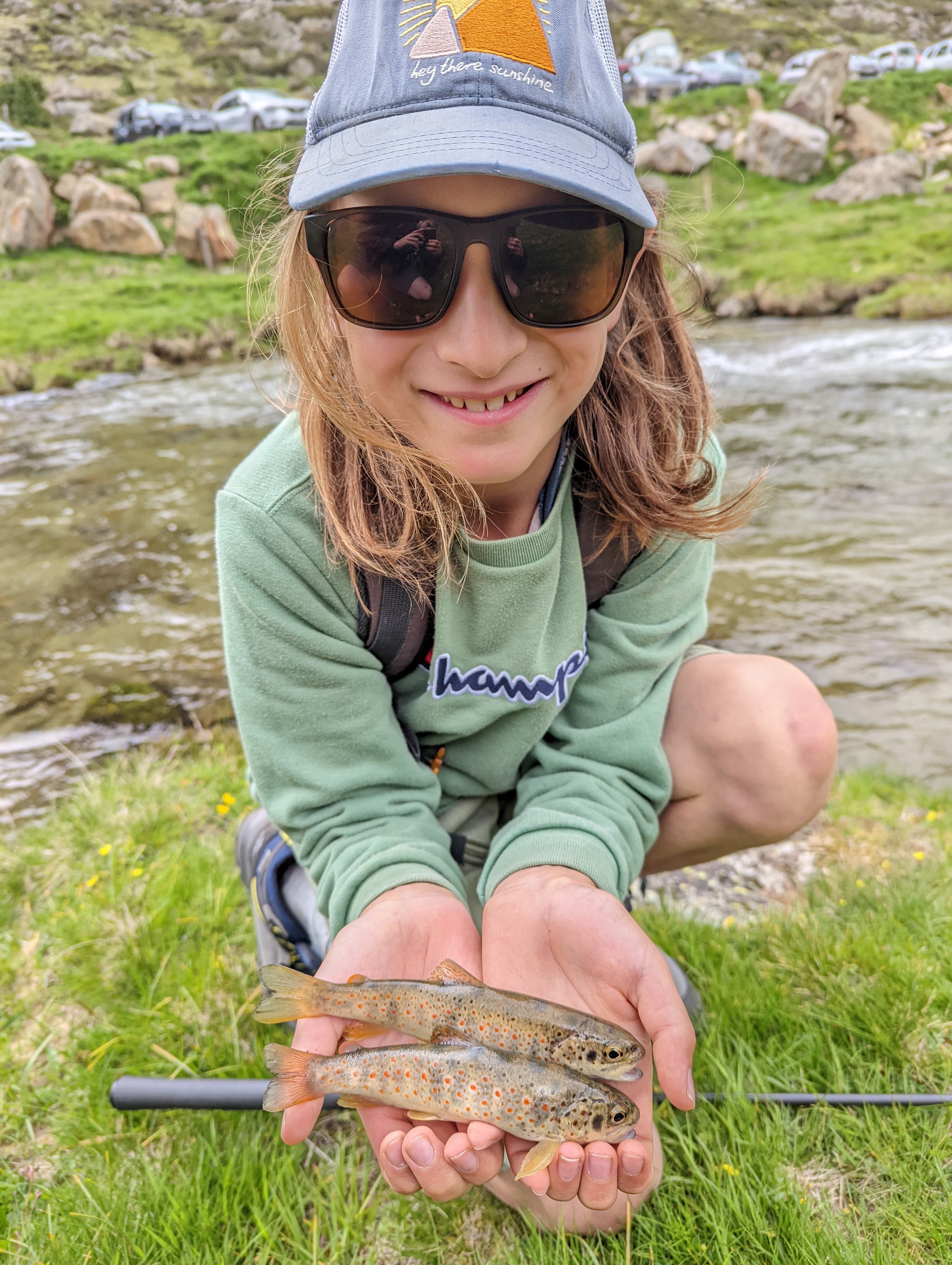 Fly fishing Ariège: catching fish during a hike in the Pyrenees.