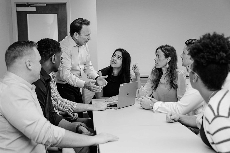 Image of a us flag and hospital mask