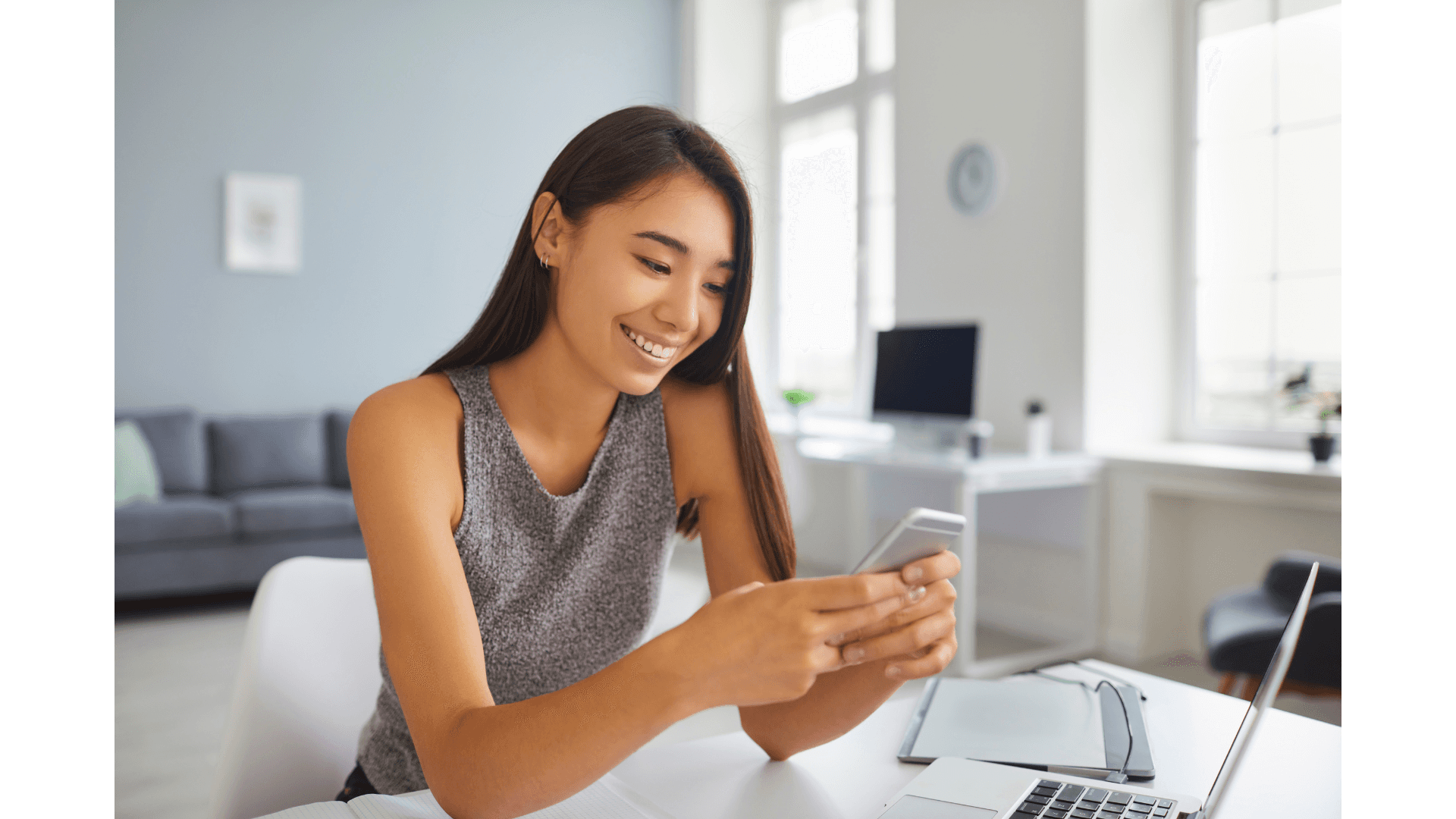 A woman making an online purchase from SMS marketing