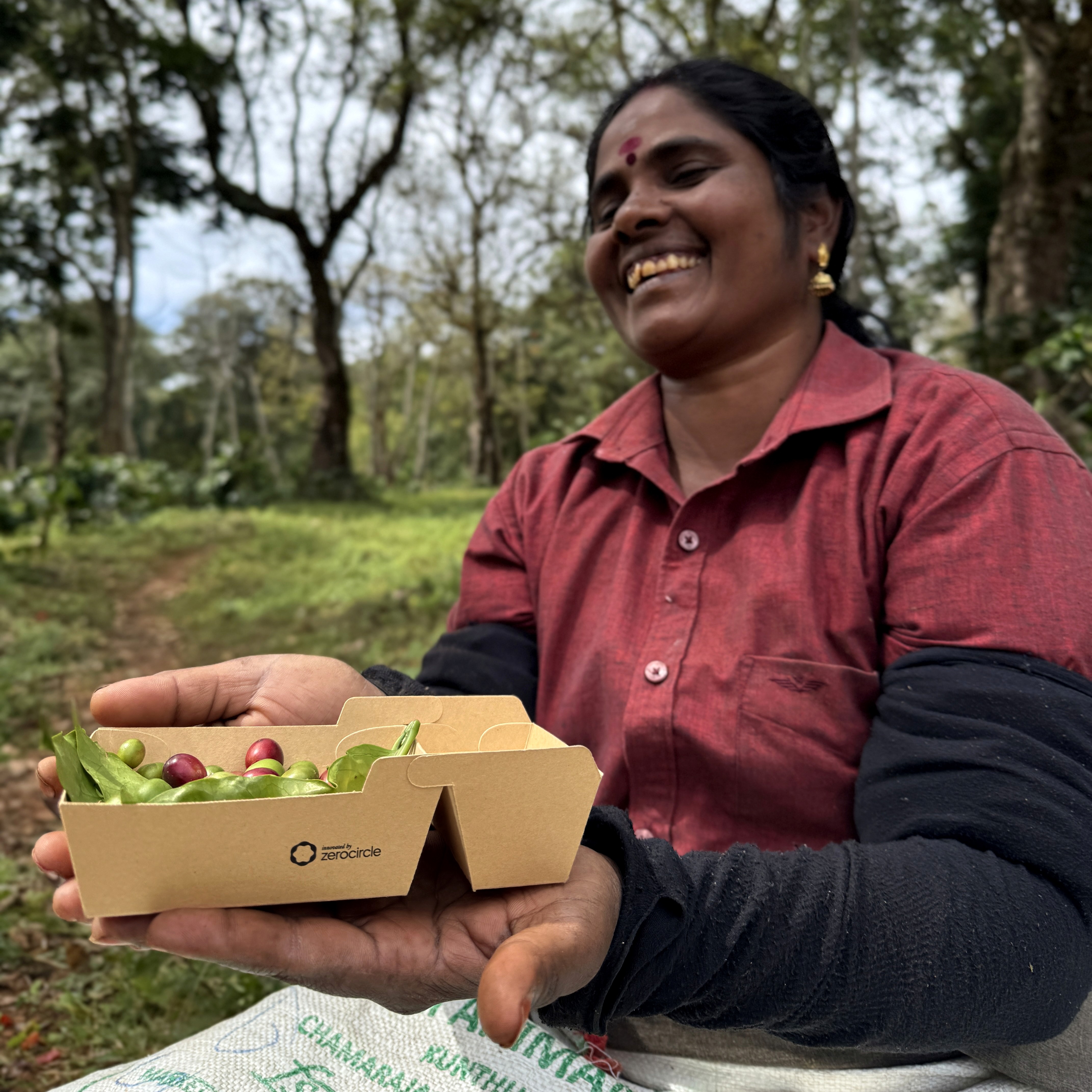 Farm fields with barn and mountains in background