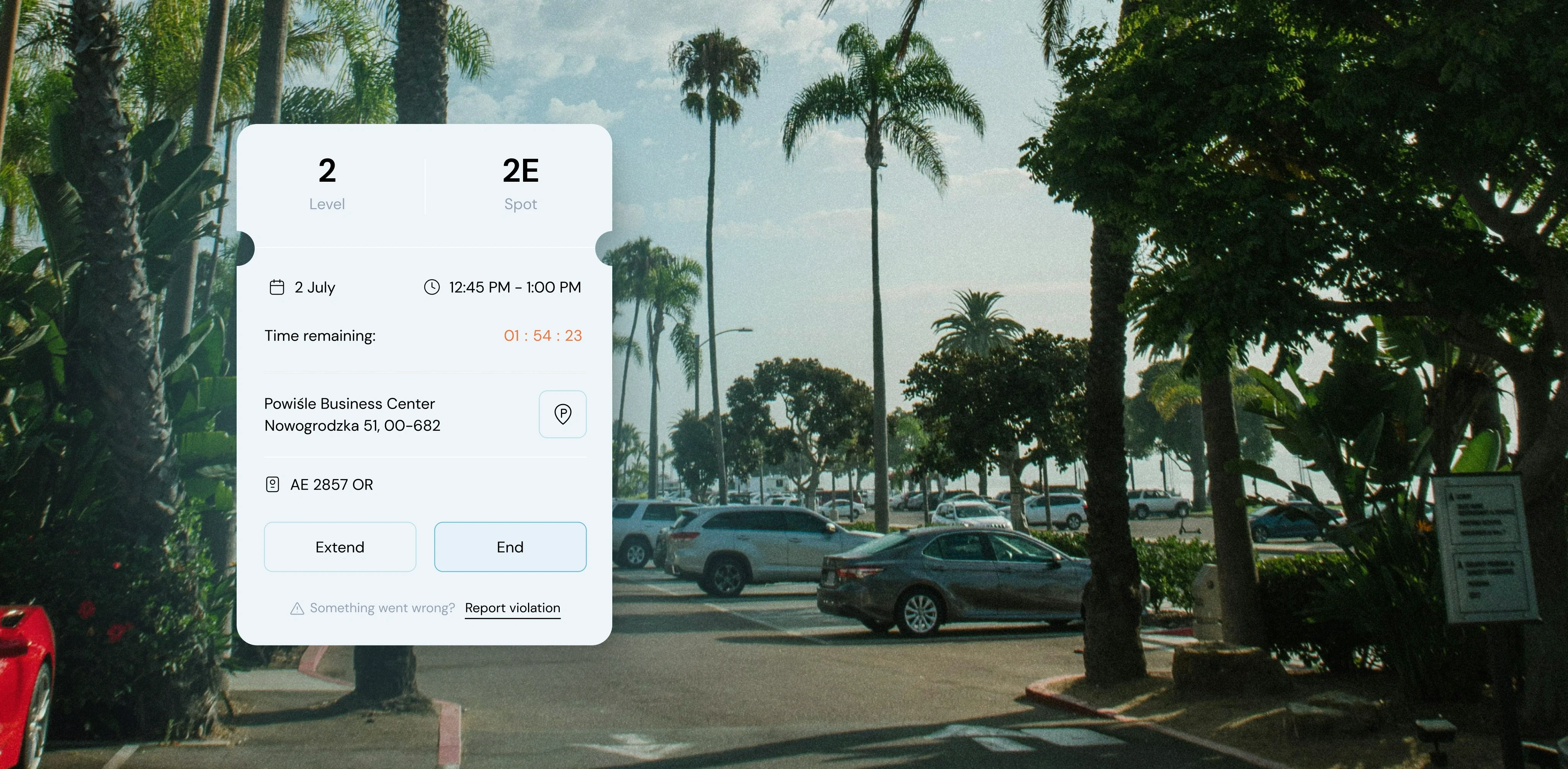 A parking interface displayed on a smartphone screen over a background of a sunny palm tree-lined parking lot. The interface shows details for a parking session on Level 2, Spot 2E, with a remaining time countdown of 1 hour 54 minutes and 23 seconds. The parking location is listed as Powiśle Business Center, Nowogrodzka 51, 00-682, with a car license plate AE 2857 OR. There are buttons to "Extend" or "End" the session, and an option to "Report violation" if something goes wrong.