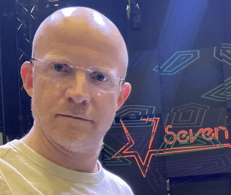 a cocktail glass with a cherry