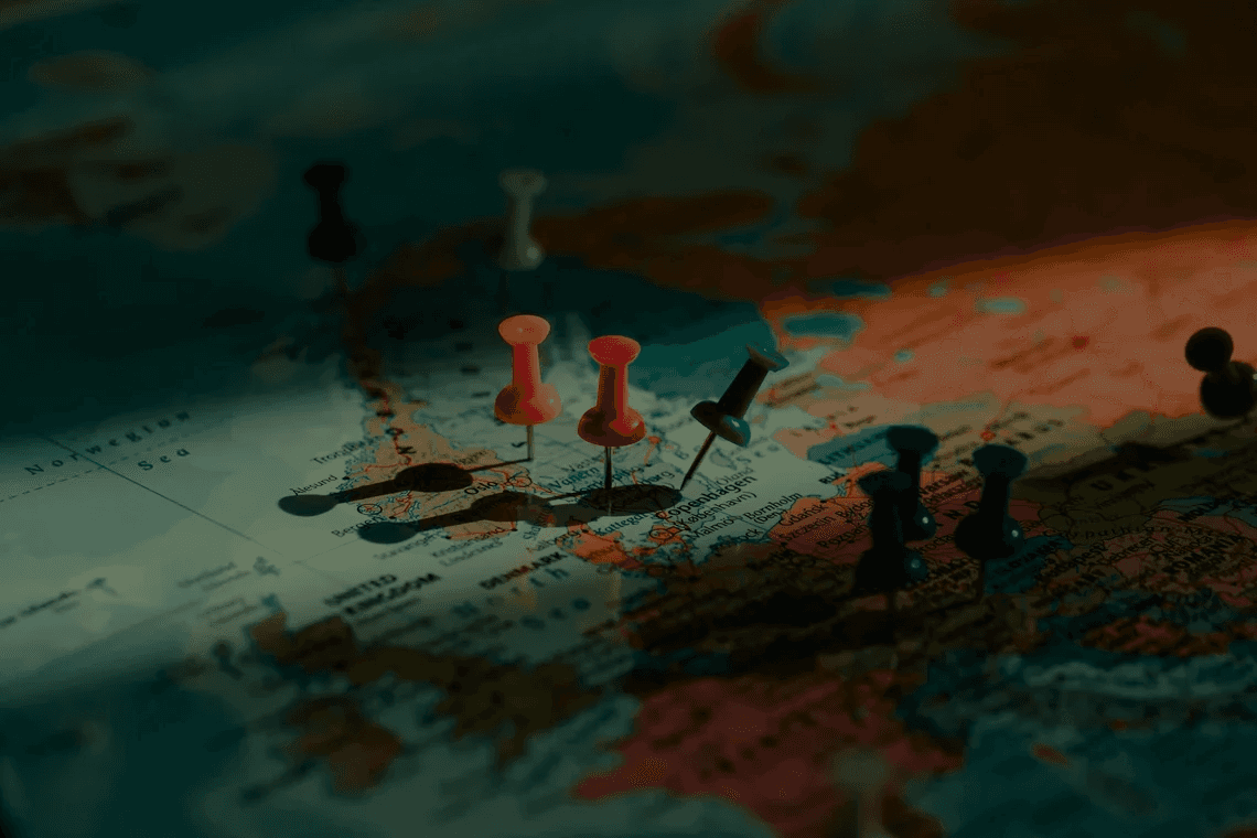 Pushpins on a world map