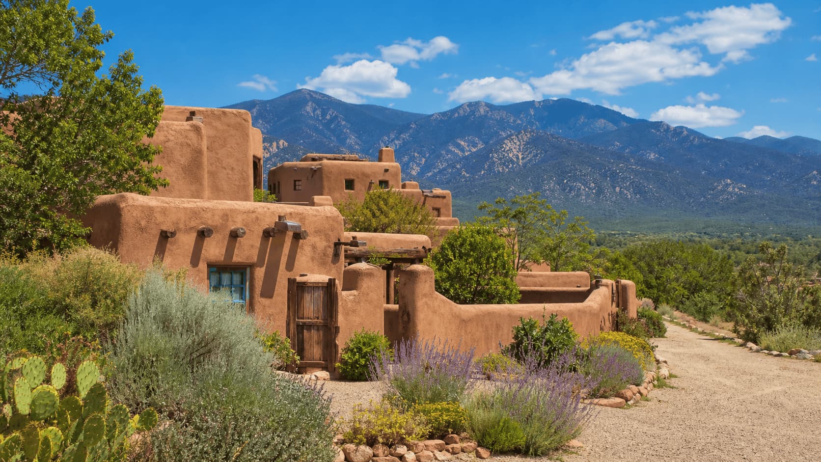 Santa Fe adobe buildings with desert landscape and mountains
