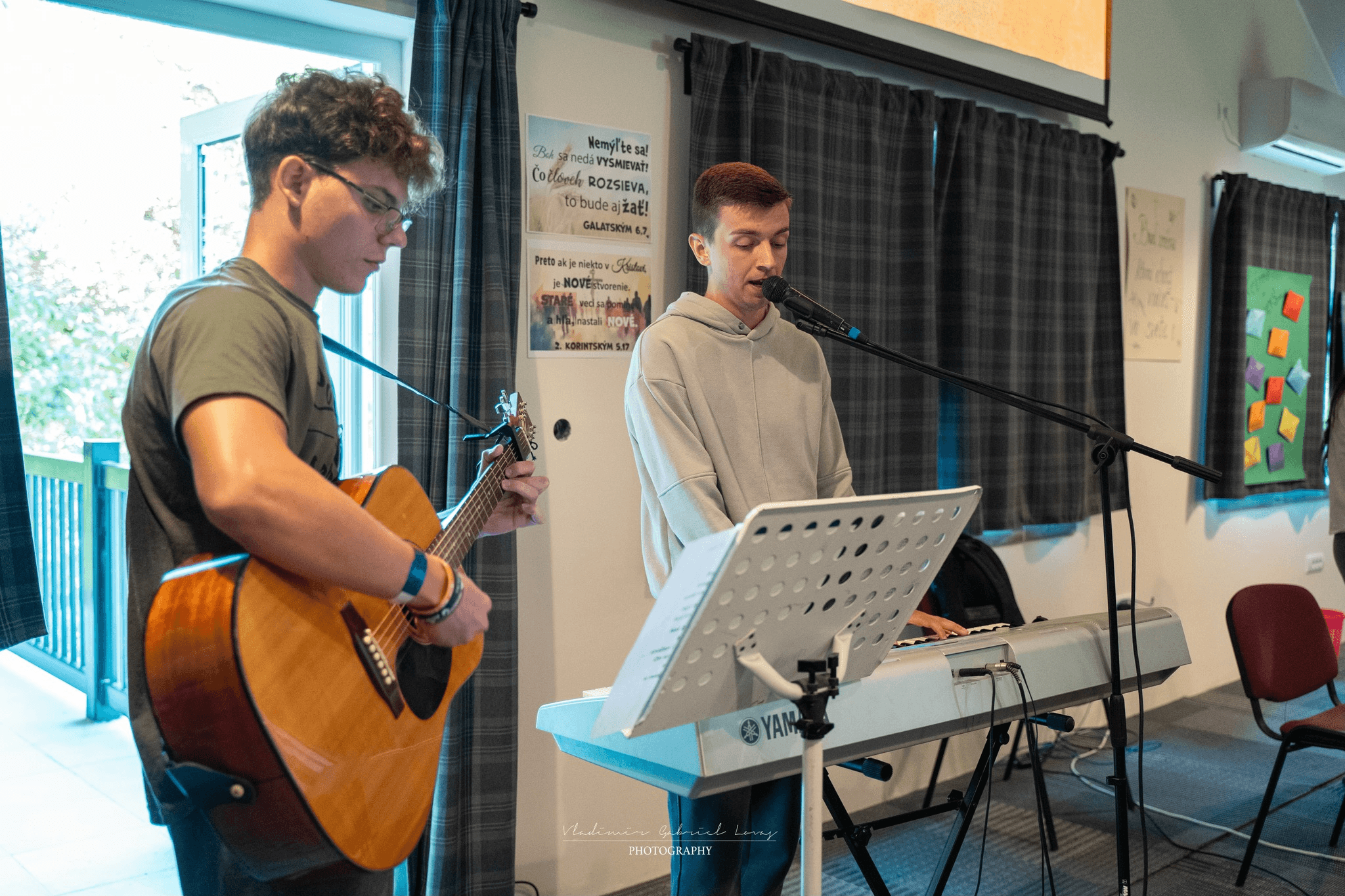 Kids singing a praying to god trough music