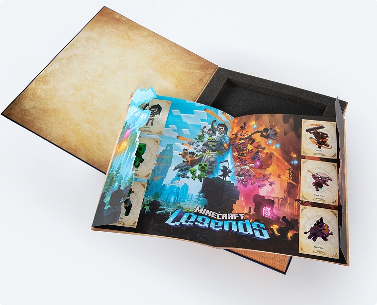Minecraft legends foldout art displayed over the opened book packaging