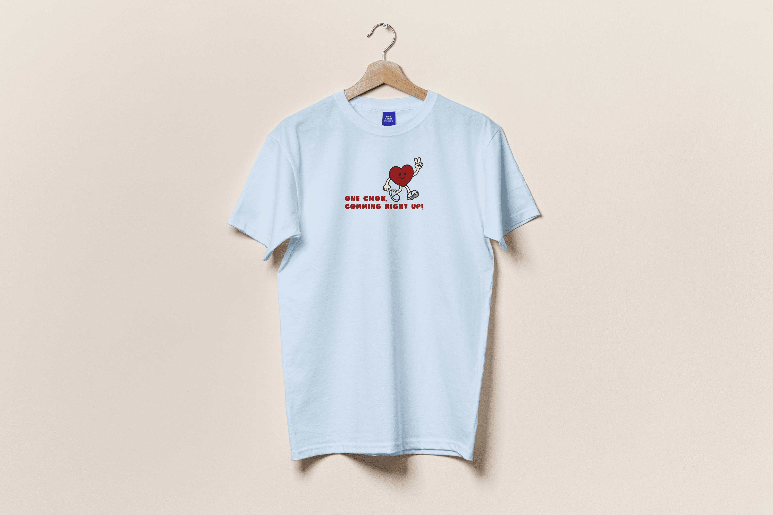 cmok logo printed on a light blue t-shirt
