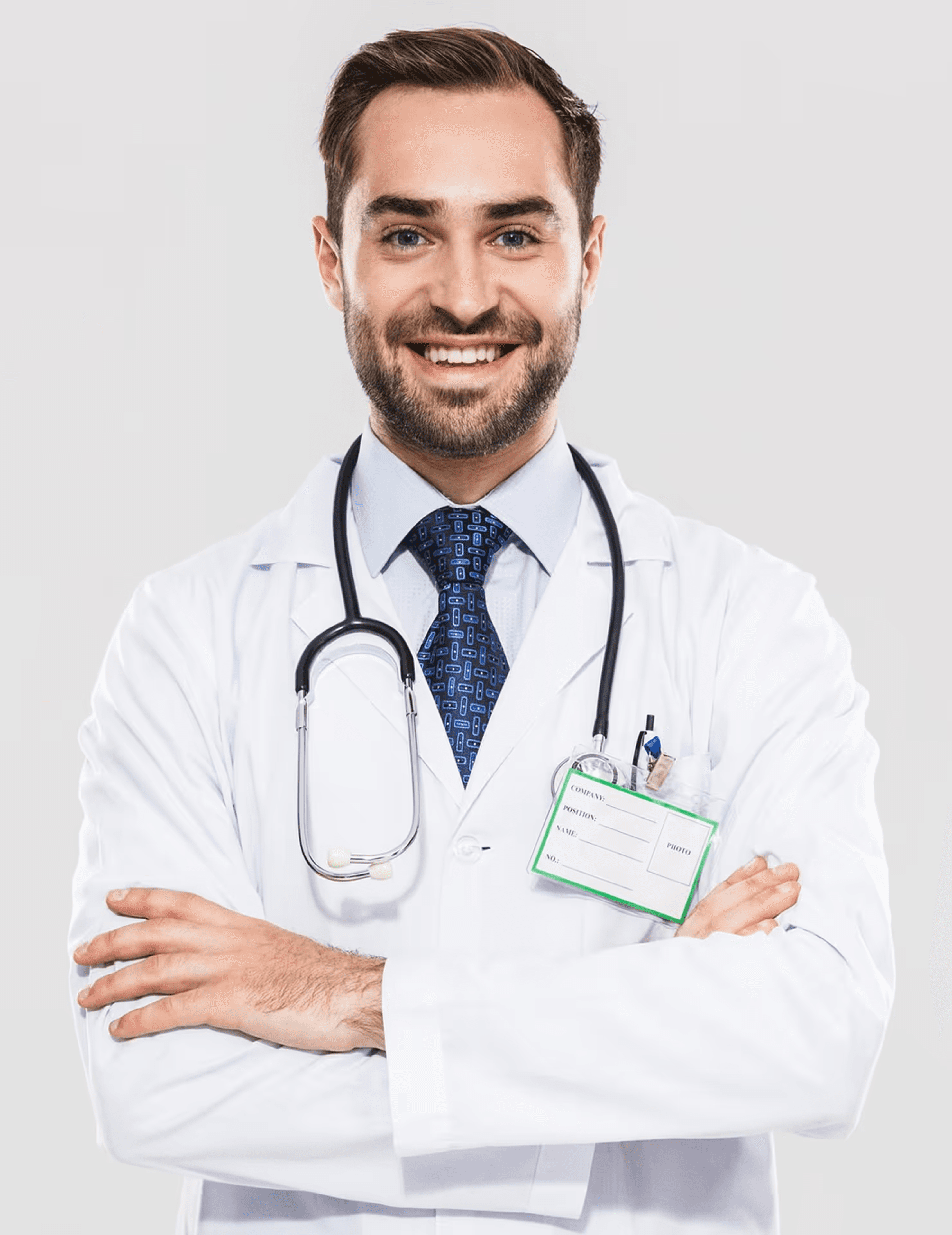 a man in a lab coat standing with his hands on his hips