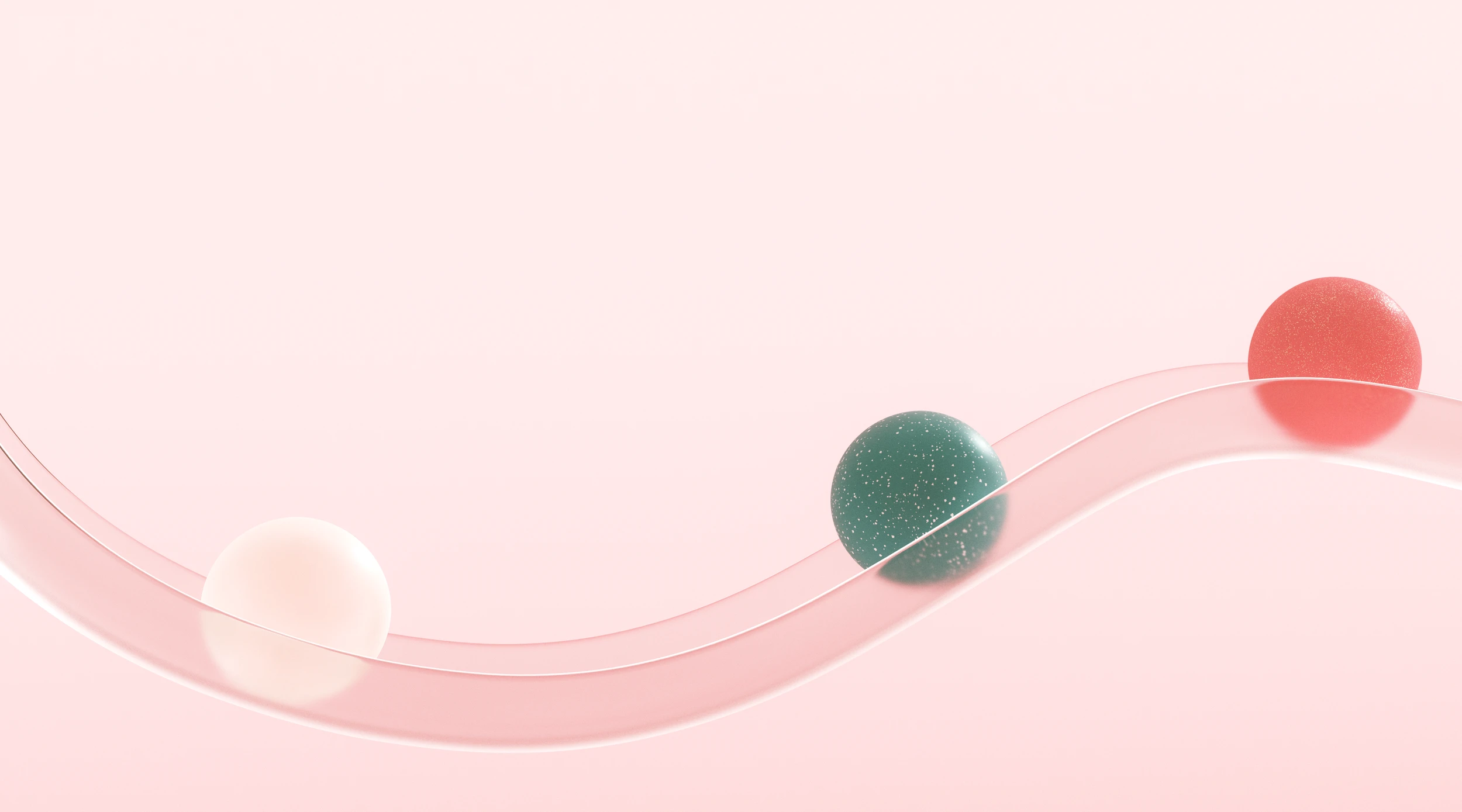 Sculptural spheres on a transparent curved track