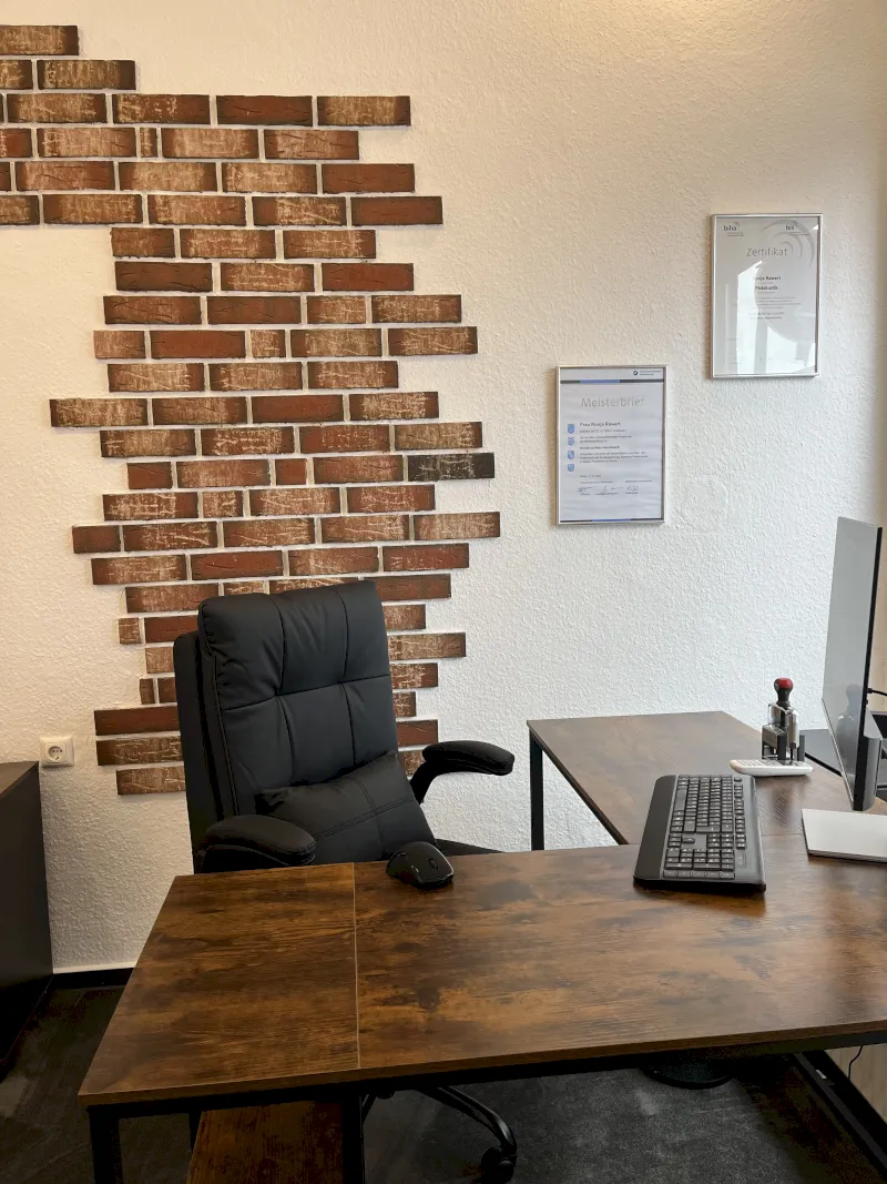 black flat screen tv on brown wooden table