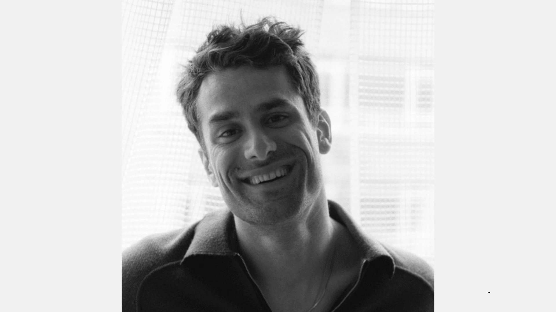 Michael Pusateri, smiling casually, as featured in the article about Shady Dnaf.
