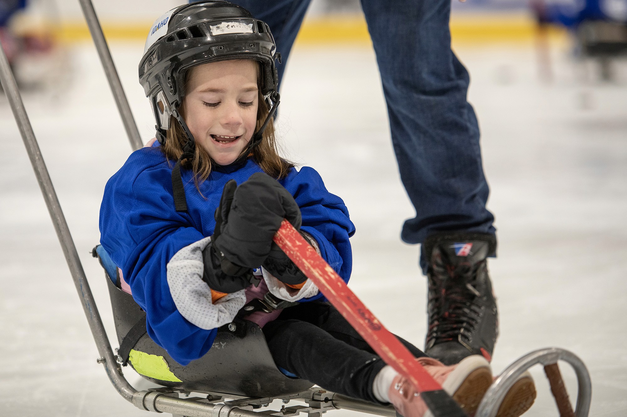 Zella playing sled hockey at CAF-Idaho’s Winter Sports Weekend. [half left]