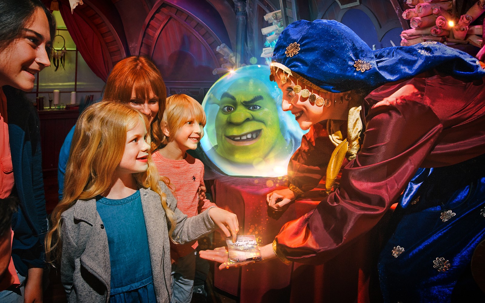 Visitors enjoying interactive Shrek's Adventure tour in London, featuring fun-filled activities and characters from the movie