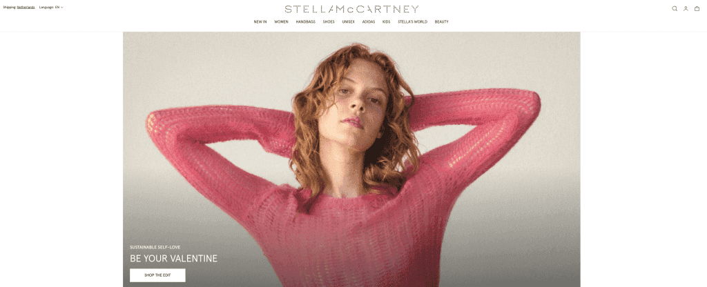 Stella McCartney webshop on Shopify with a model in a pink knit sweater and the 'Be your Valentine' campaign