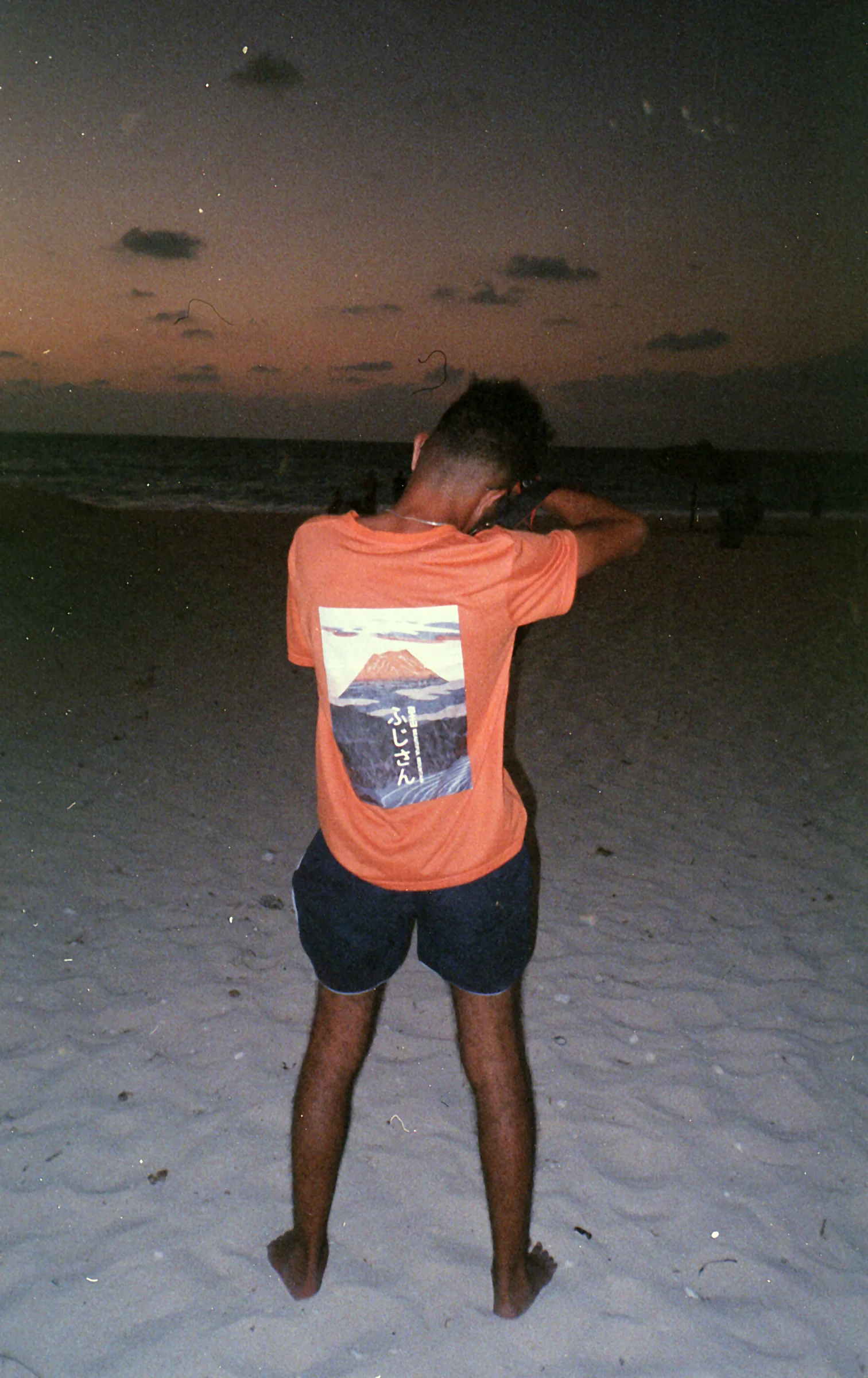 Orange Shirt at the Shore