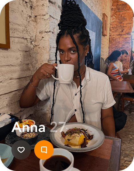 A profile photo of a young woman with braids drinking a cup of coffee