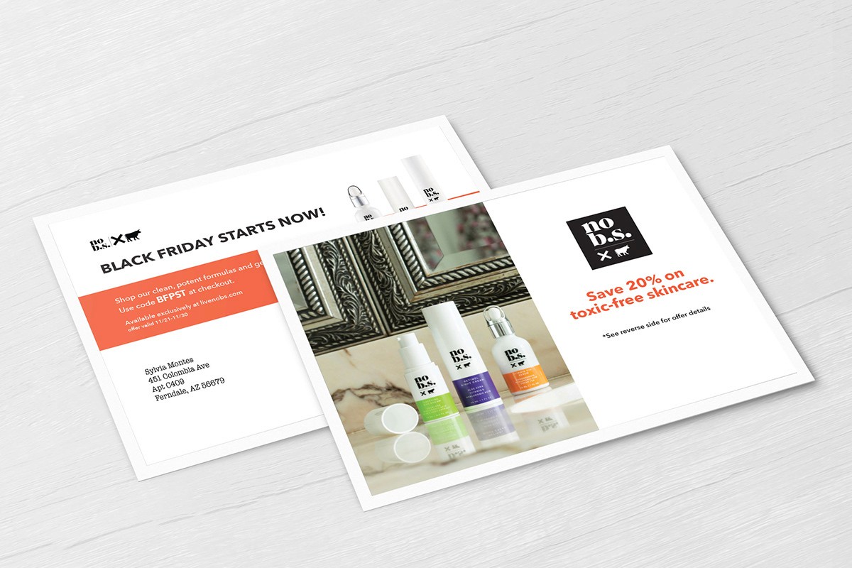 An image showing the front and back of a mailer for Black Friday.