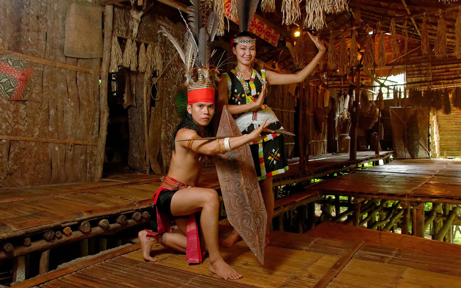 Traditional dancers performing at Mari Mari Cultural Village in Sabah, Malaysia.