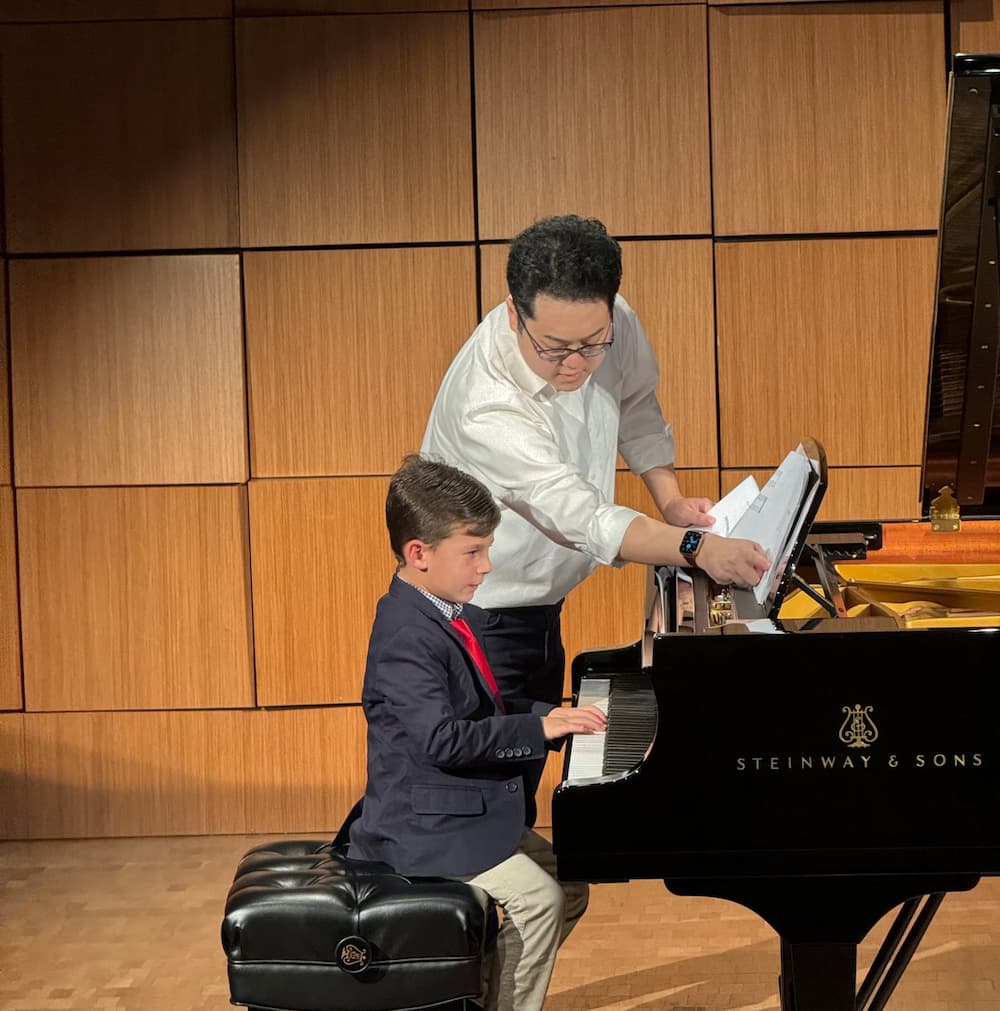 Meyer nam instructing one of his students.