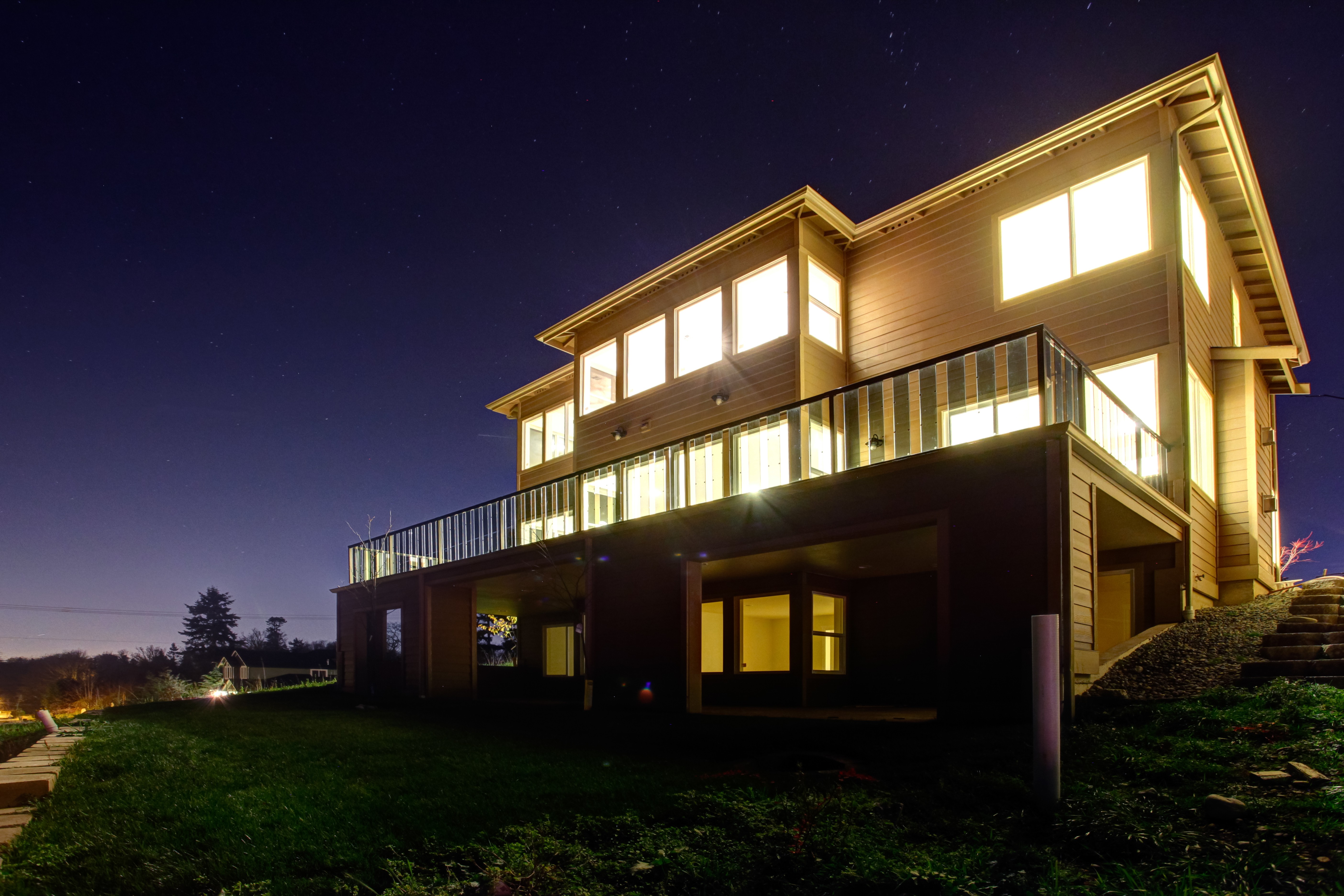 Close-up of a tree stump showing growth rings and a textured brown wood surface.