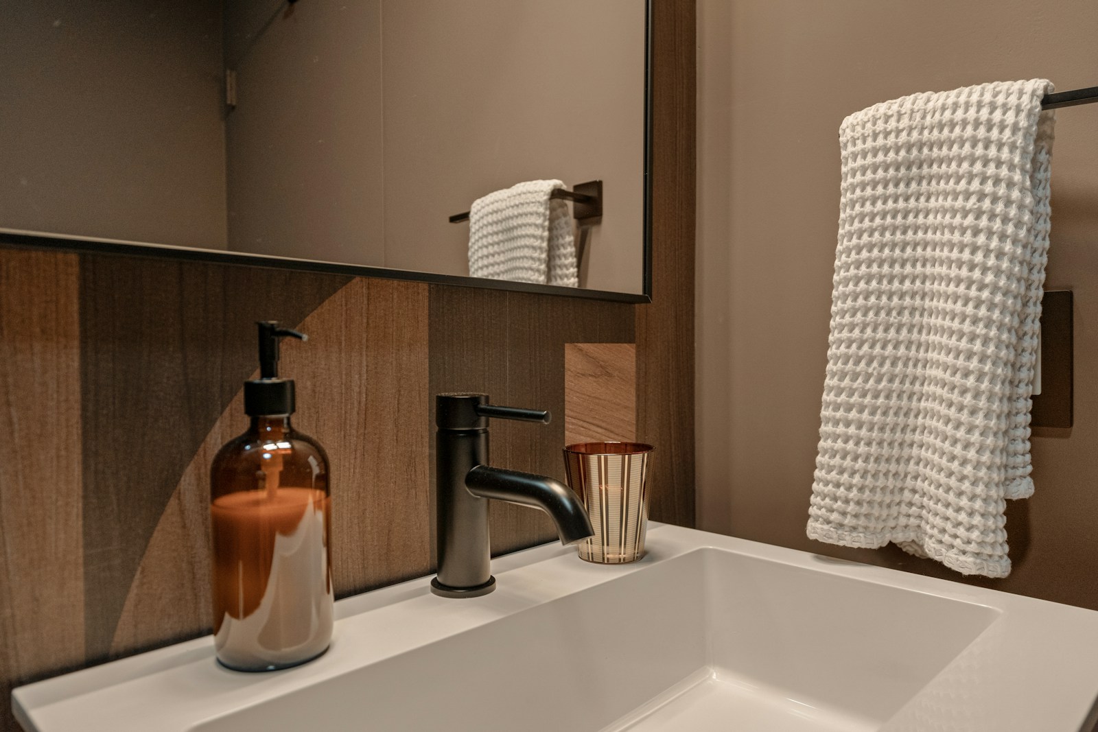 Warm powder room sink detail