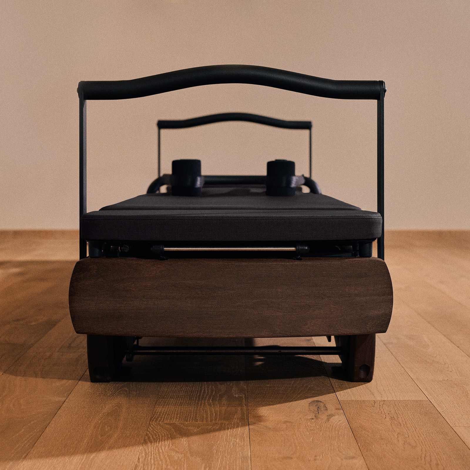 Waves crash against rocky cliffs at sunset