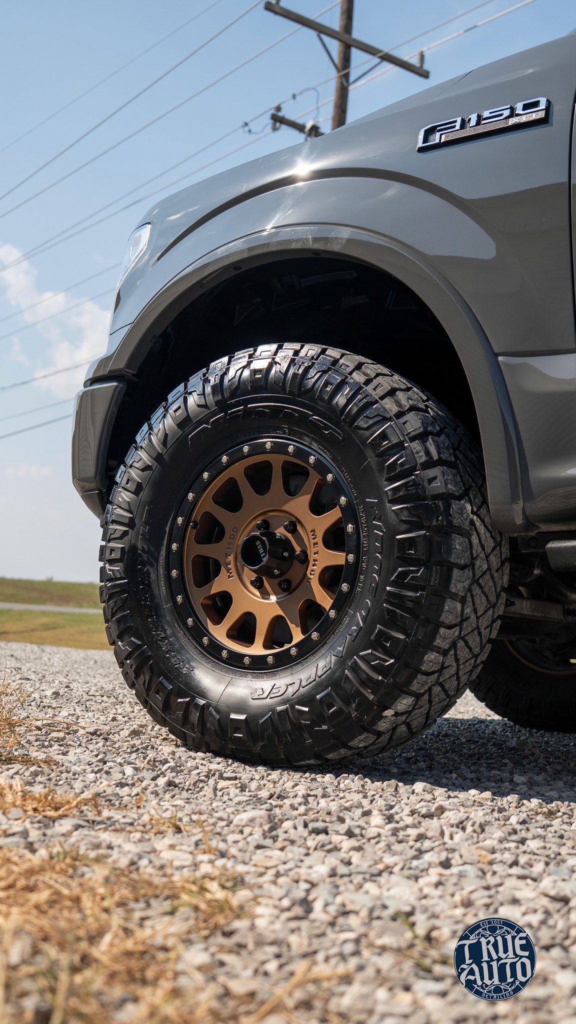 Grey ford wheel after detail