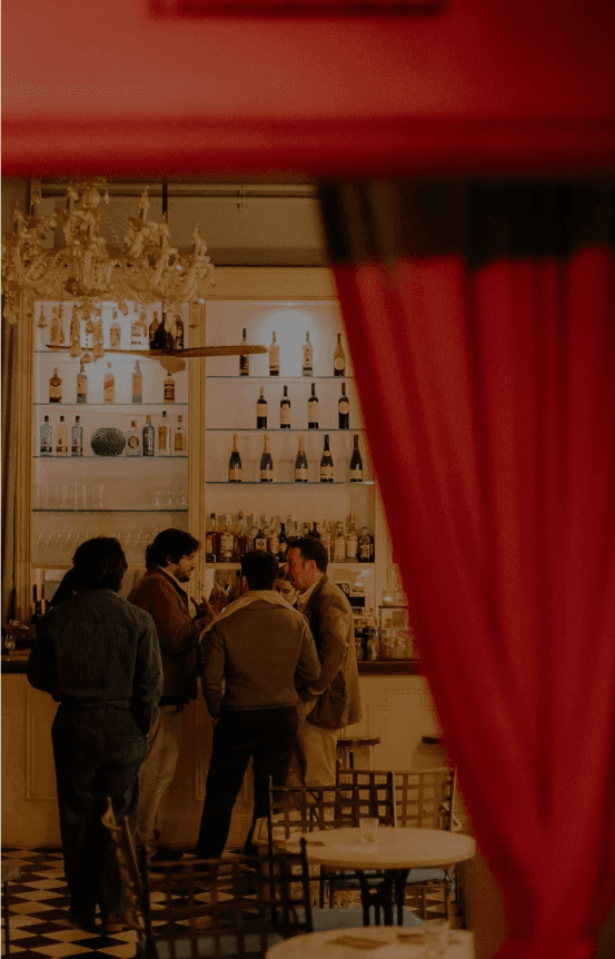 4 men ordering drinks