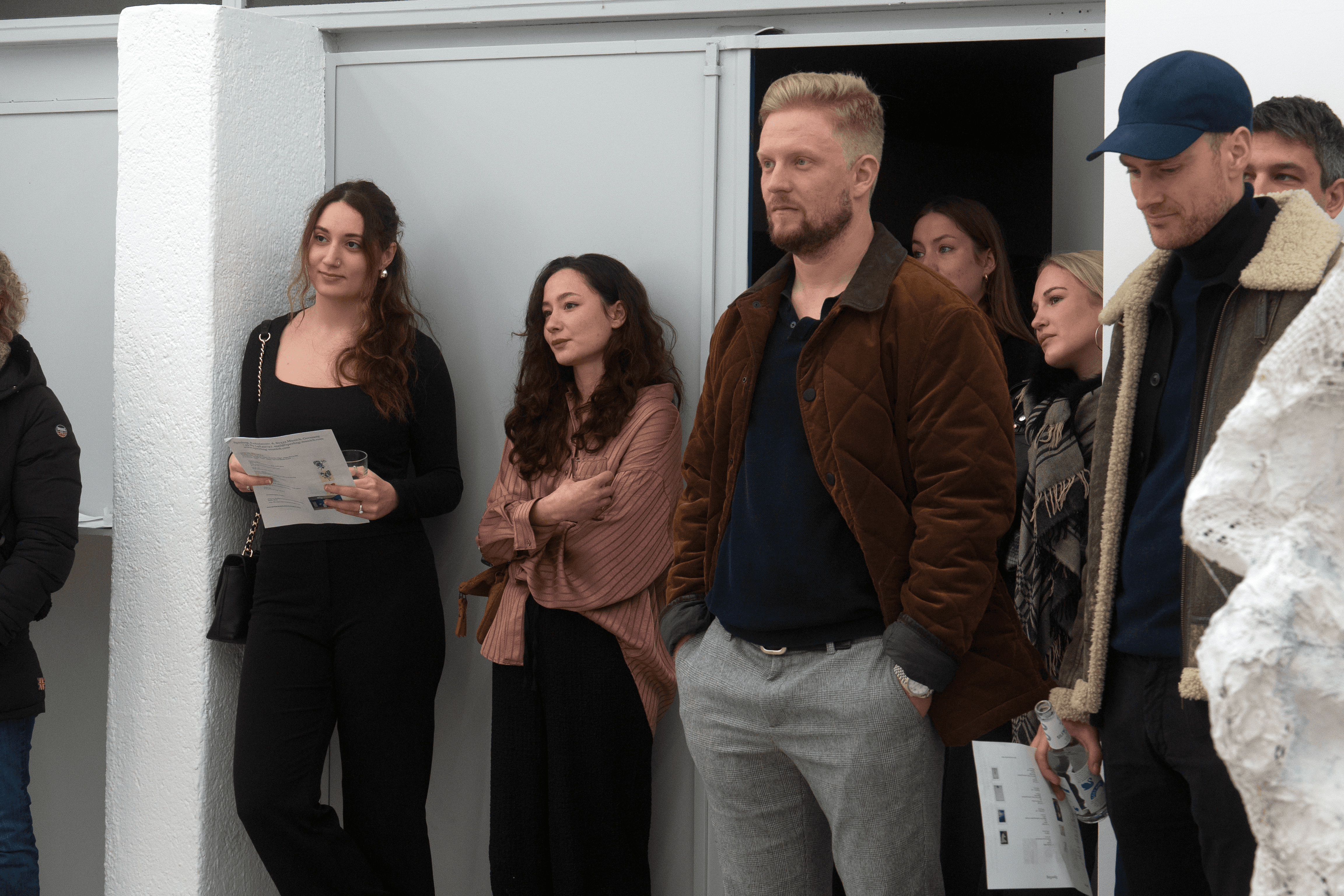 Entrepreneurs engaging in a lively discussion during a Bizz Buzz networking event.