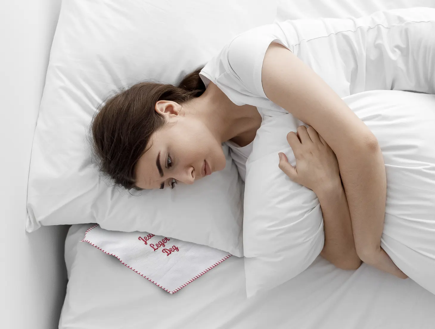 Person with anointing cloth placed under the pillow.