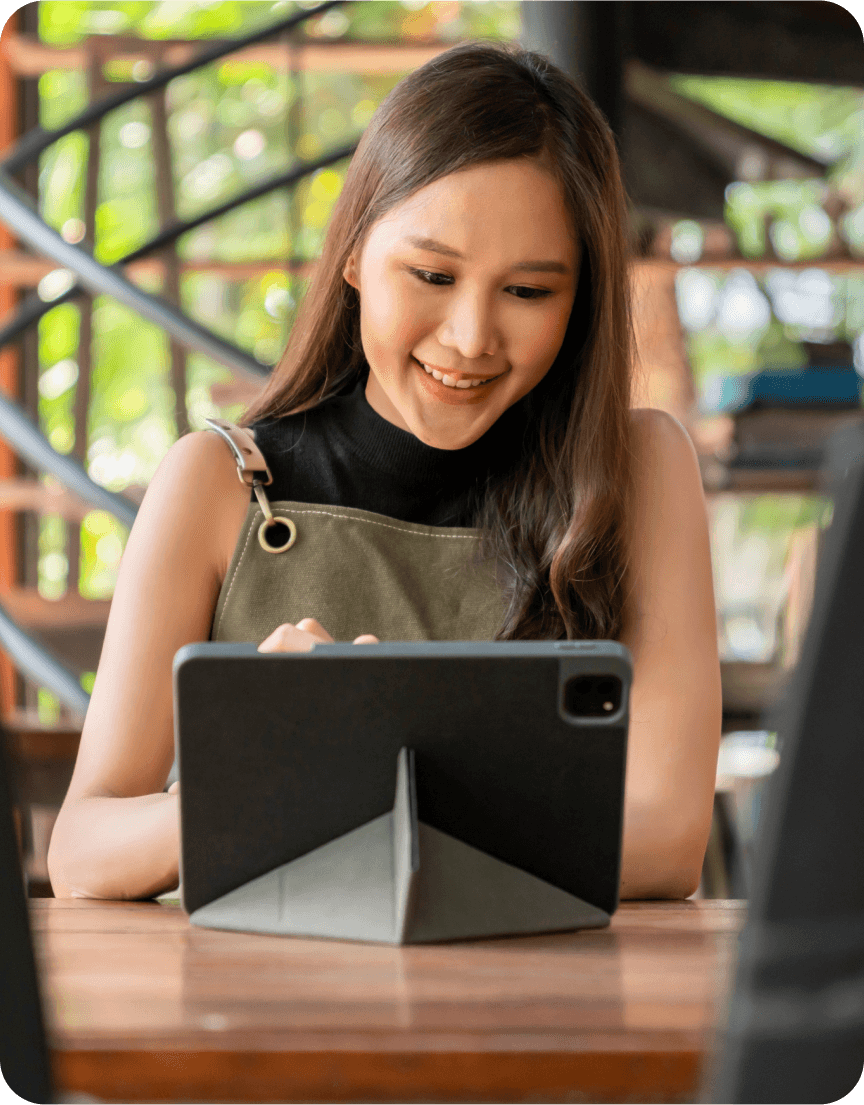 waitress serves customer in restaurant